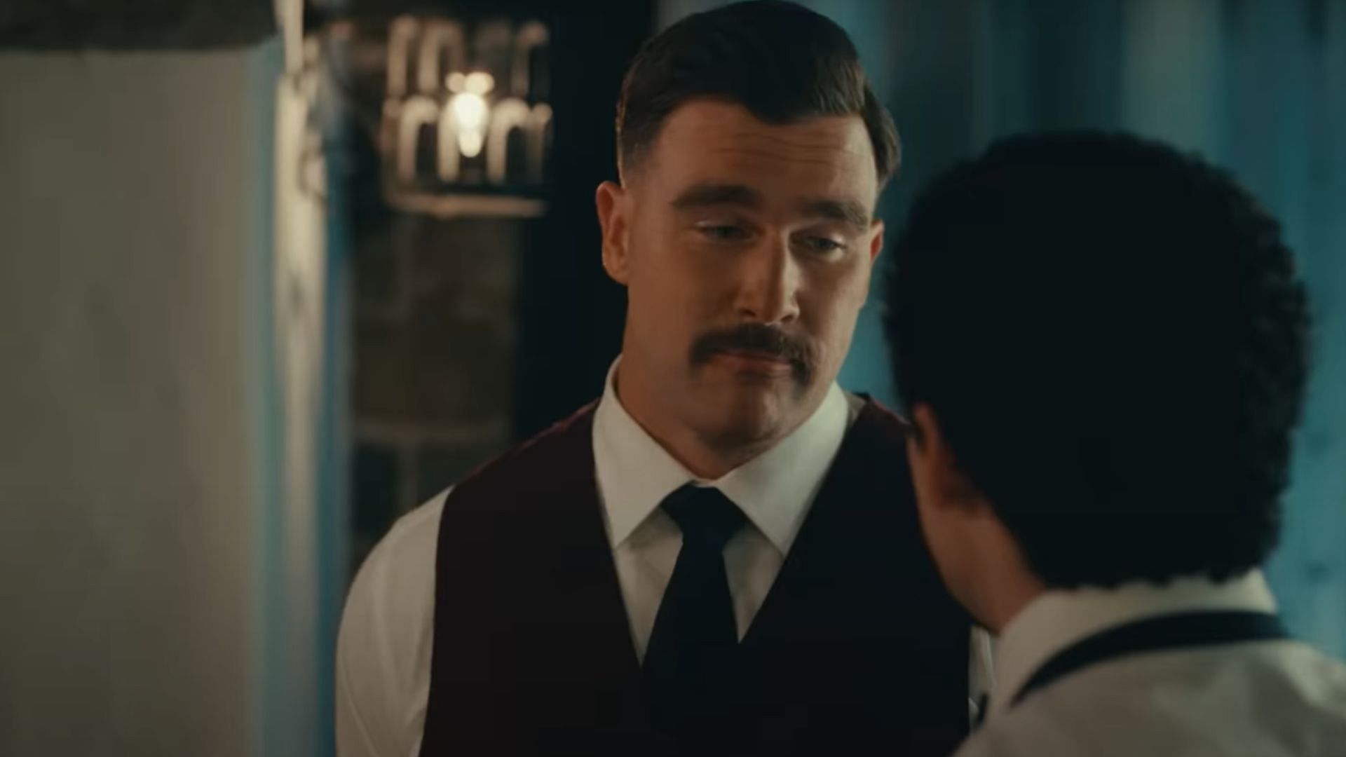 Kelce as The Waiter (Image via YouTube/Netflix)